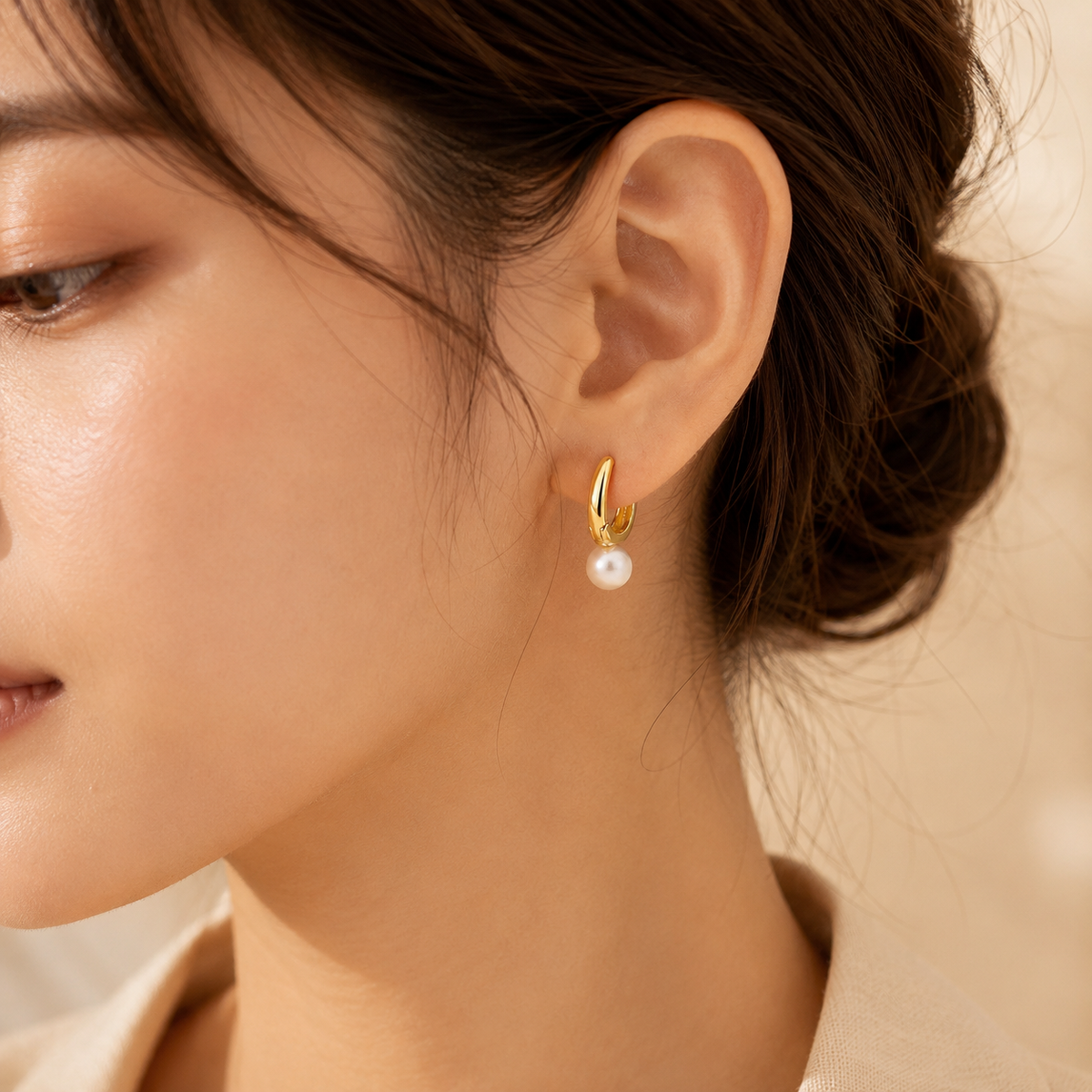 Pearl Drop Huggie Earrings – Gold-Tone Hoops with Pearl-Effect Charm