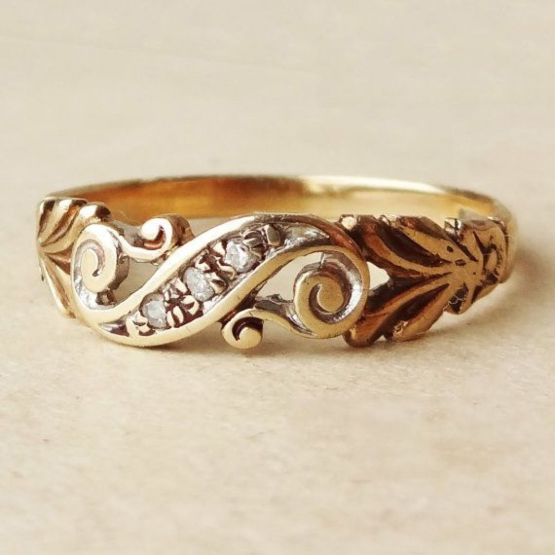Ivy Zirconia Ring – Gold-Tone Swirl Band with Leaf Detail