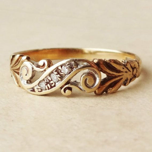 Ivy Zirconia Ring – Gold-Tone Swirl Band with Leaf Detail