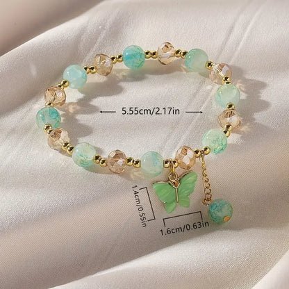 Elastic Bracelet with Faceted Beads and Butterfly Charm