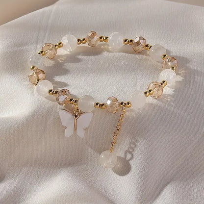 Elastic Bracelet with Faceted Beads and Butterfly Charm